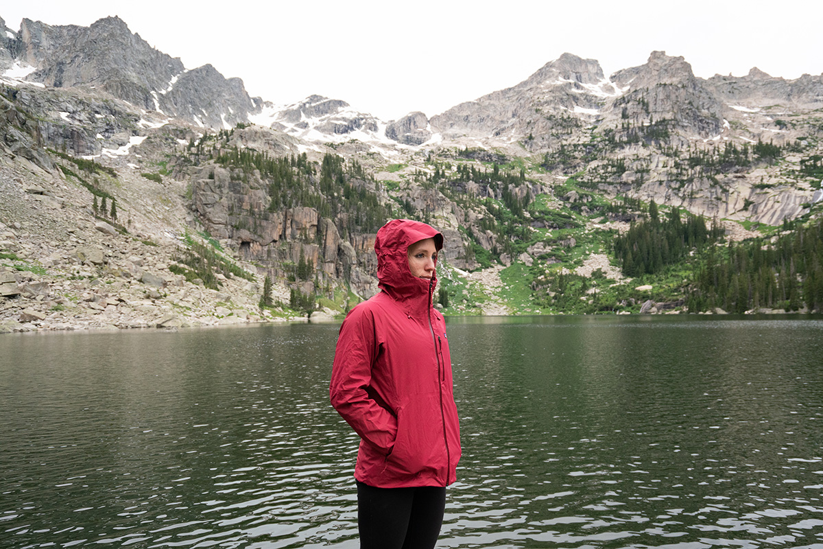Patagonia Rainshadow rain jacket (standing by lake in mountains)