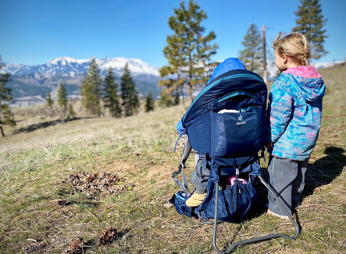 Deuter Kid Comfort baby carrier (foot stand deployed and mountain view)