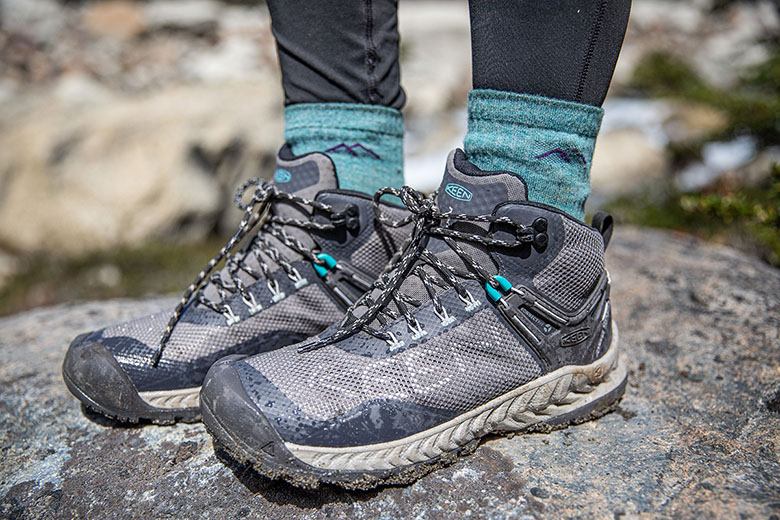 KEEN NXIS EVO WP hiking boots (standing on rock)