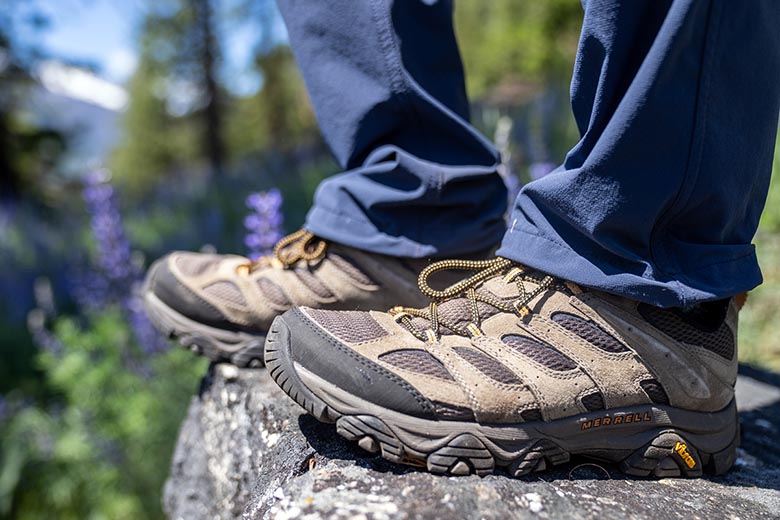 Merrell Moab 3 hiking shoes (standing on edge of rock)