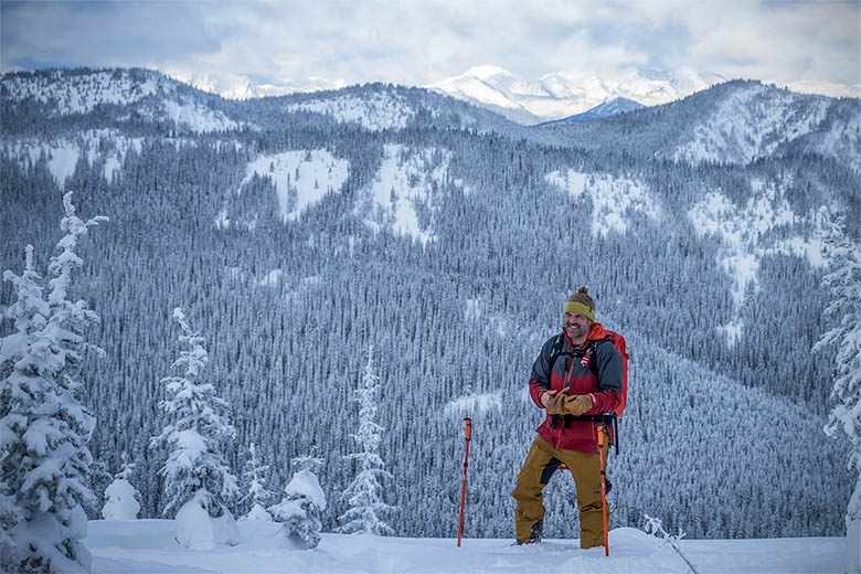 Outdoor Research Hemispheres Bib (standing in snowy backcountry)