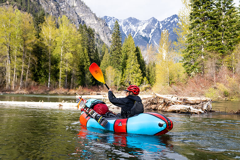 Packrafting out of mountains with skis