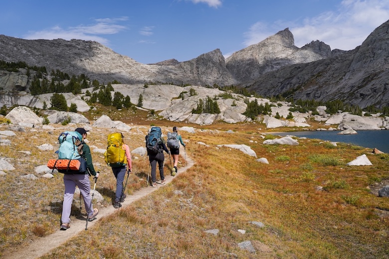 The Switchback Travel team backpacking into the Wind River Range in Wyoming