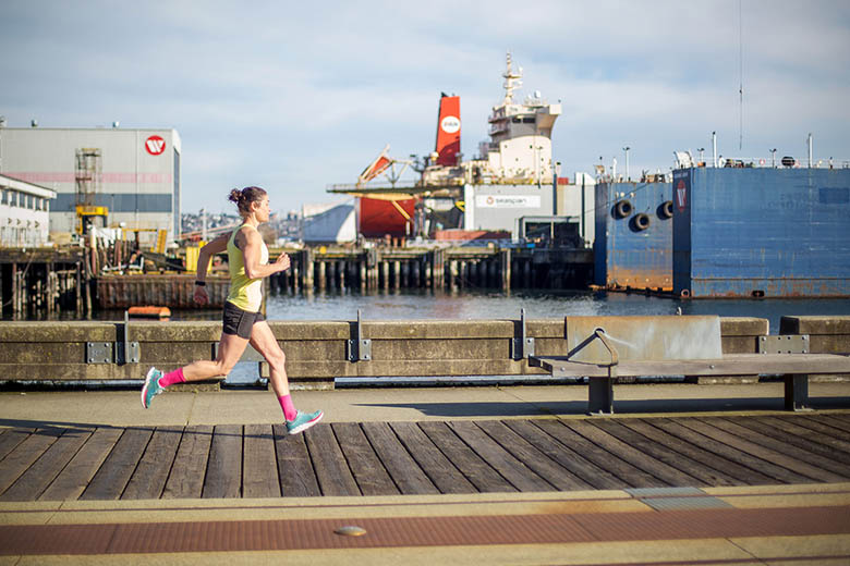 Running shoes (running on boardwalk)