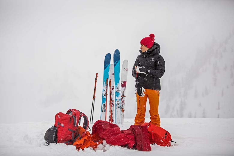 Ski gear (standing next to skis and poles)