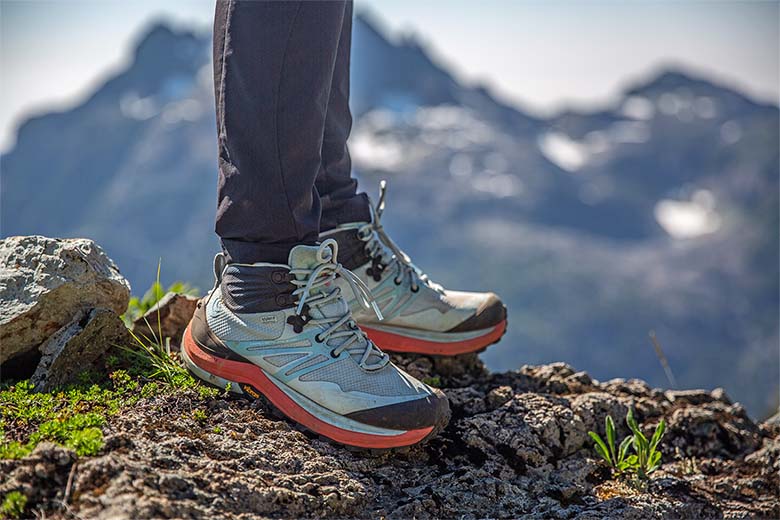 Topo Athletic Trailventure 2 hiking boots (standing on rock in mountains)