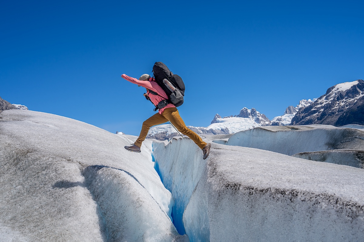 Jumping across a crevasse in Chilean Patagonia
