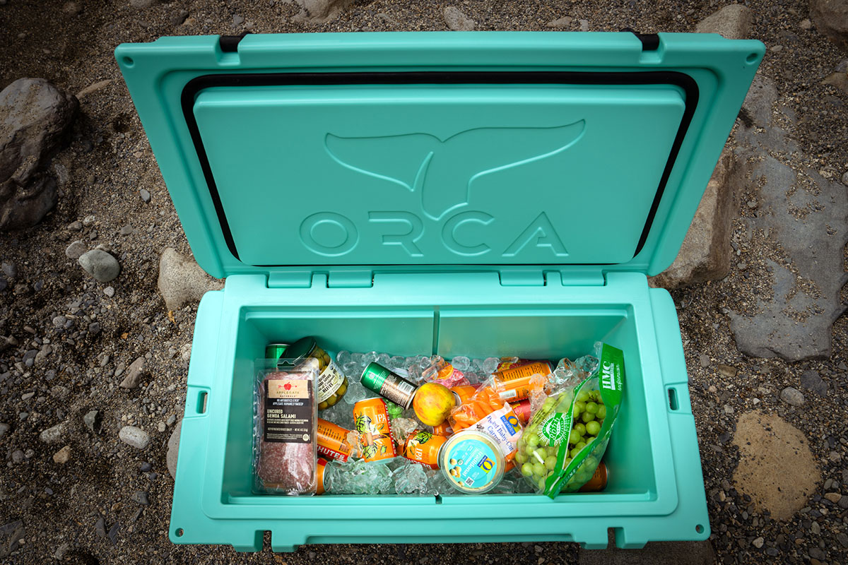 Wheeled cooler (ORCA 65 Quart Wheeled Cooler full of food and ice)