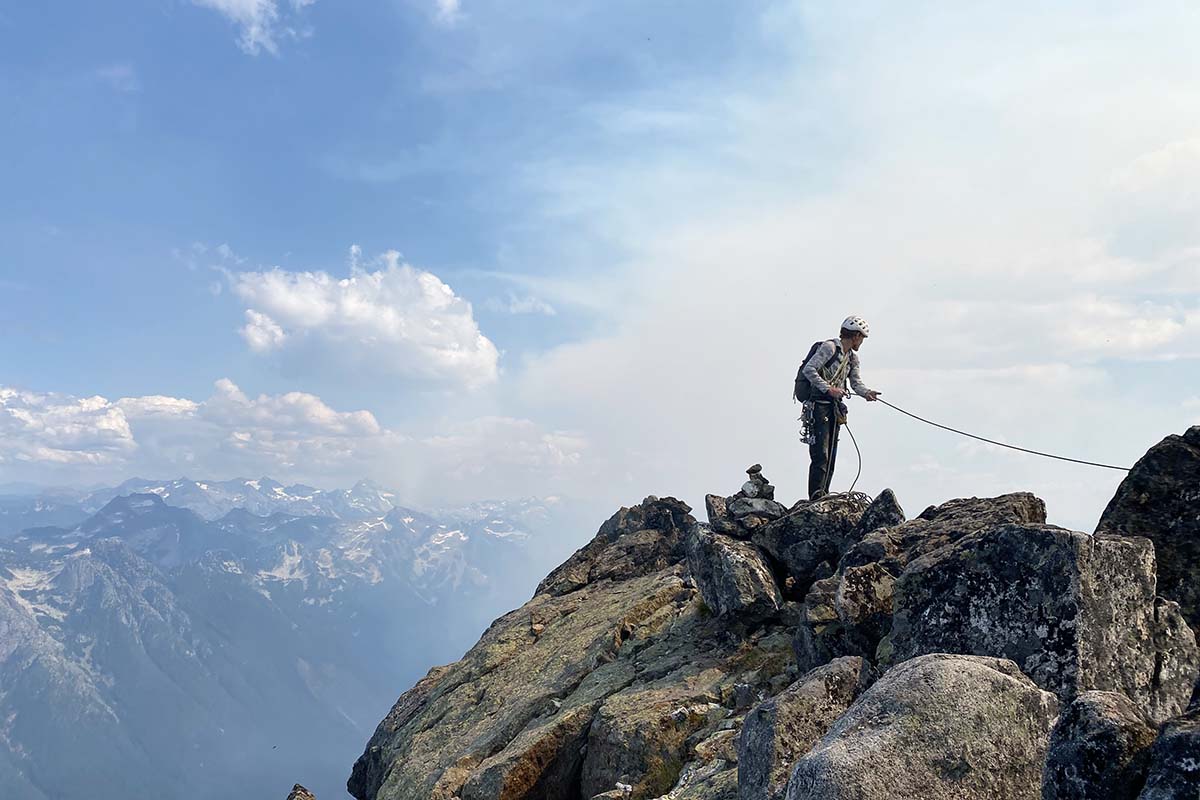 Pulling climbing rope on the summit of Slesse