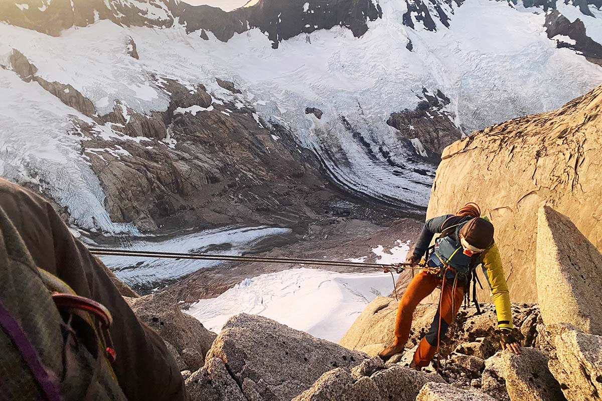 Rappeling at sunset in Patagonia (climbing harness and rope)