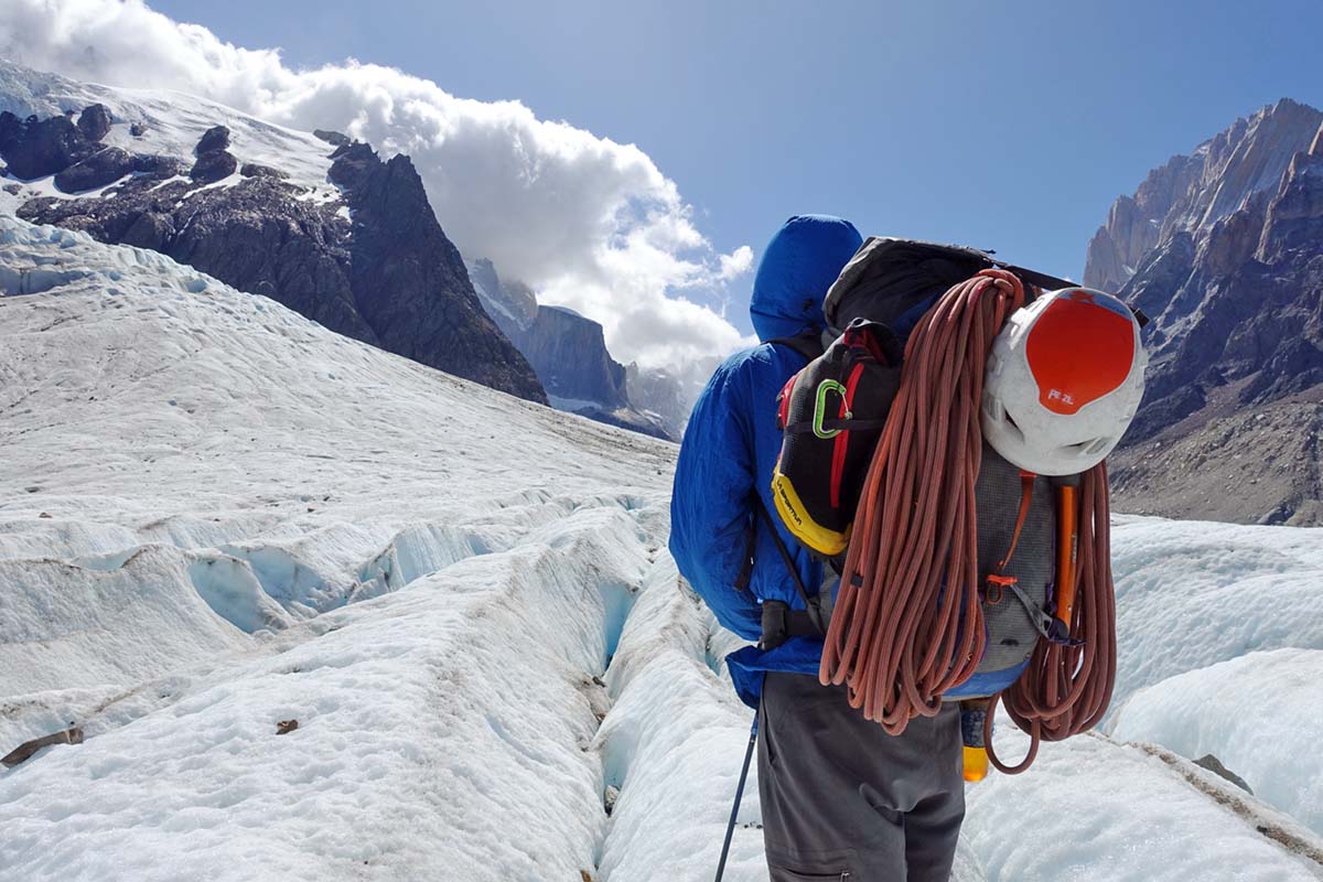 Alpine climbing backpack on approach to Torre Valley