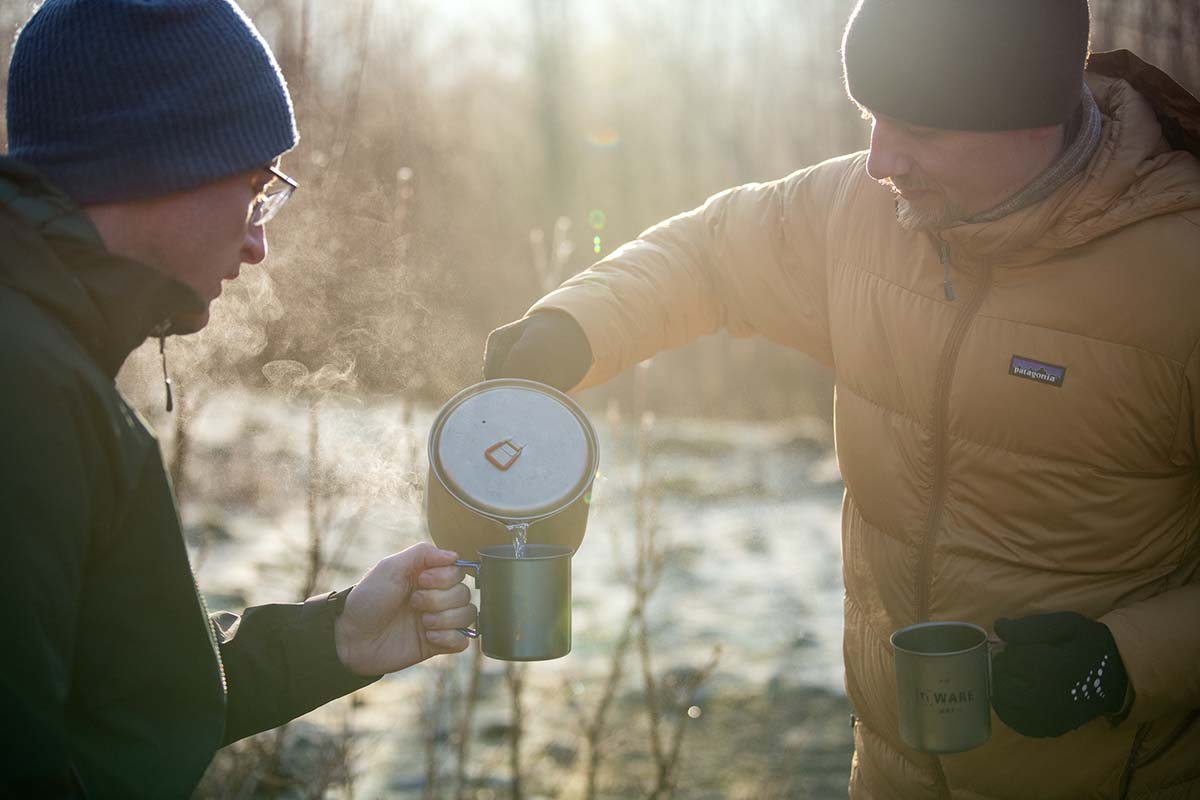 Pouring hot water into cup (morning coffee while backpacking)