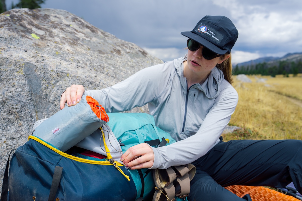Backpacking Backpacks (accessing REI Trailmade's bottom pocket)
