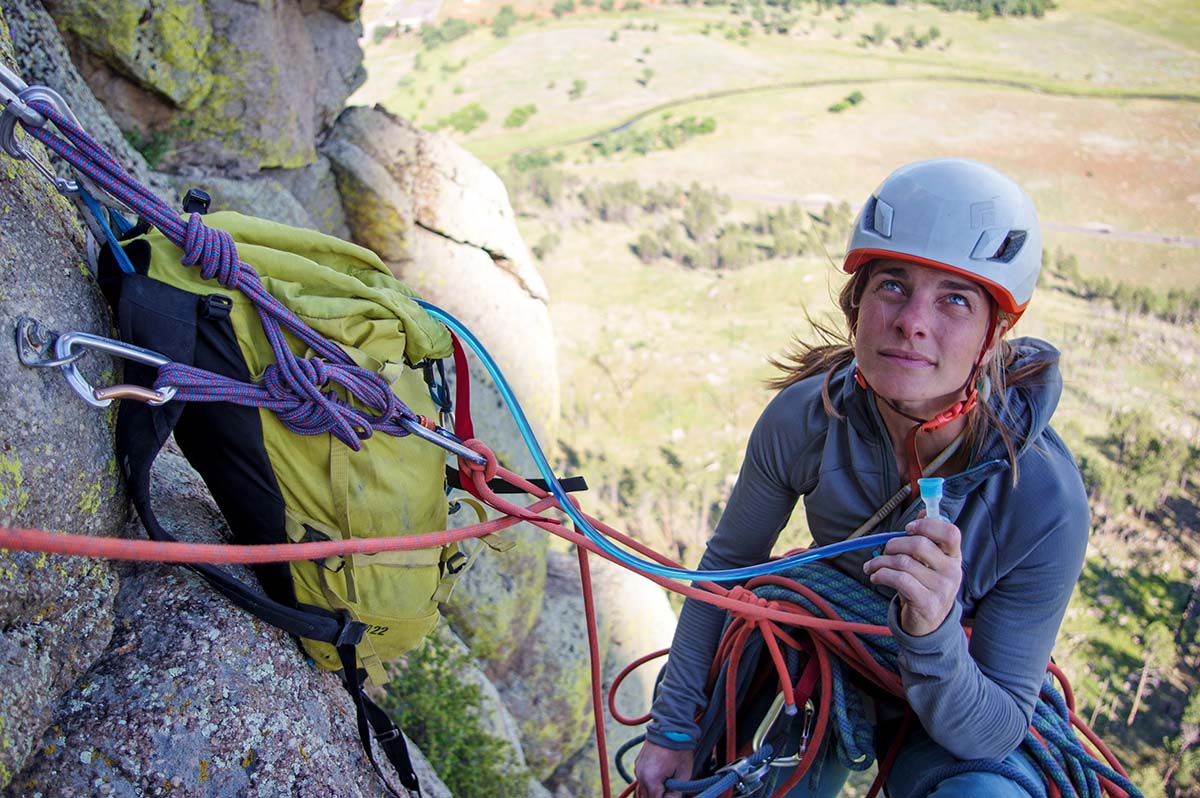 Drinking from a hydration bladder while climbing_