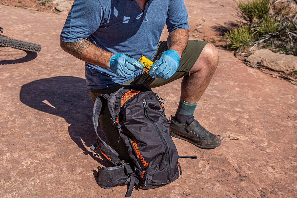 Mountain bike pack (Patagonia Dirt Roamer on the ground)