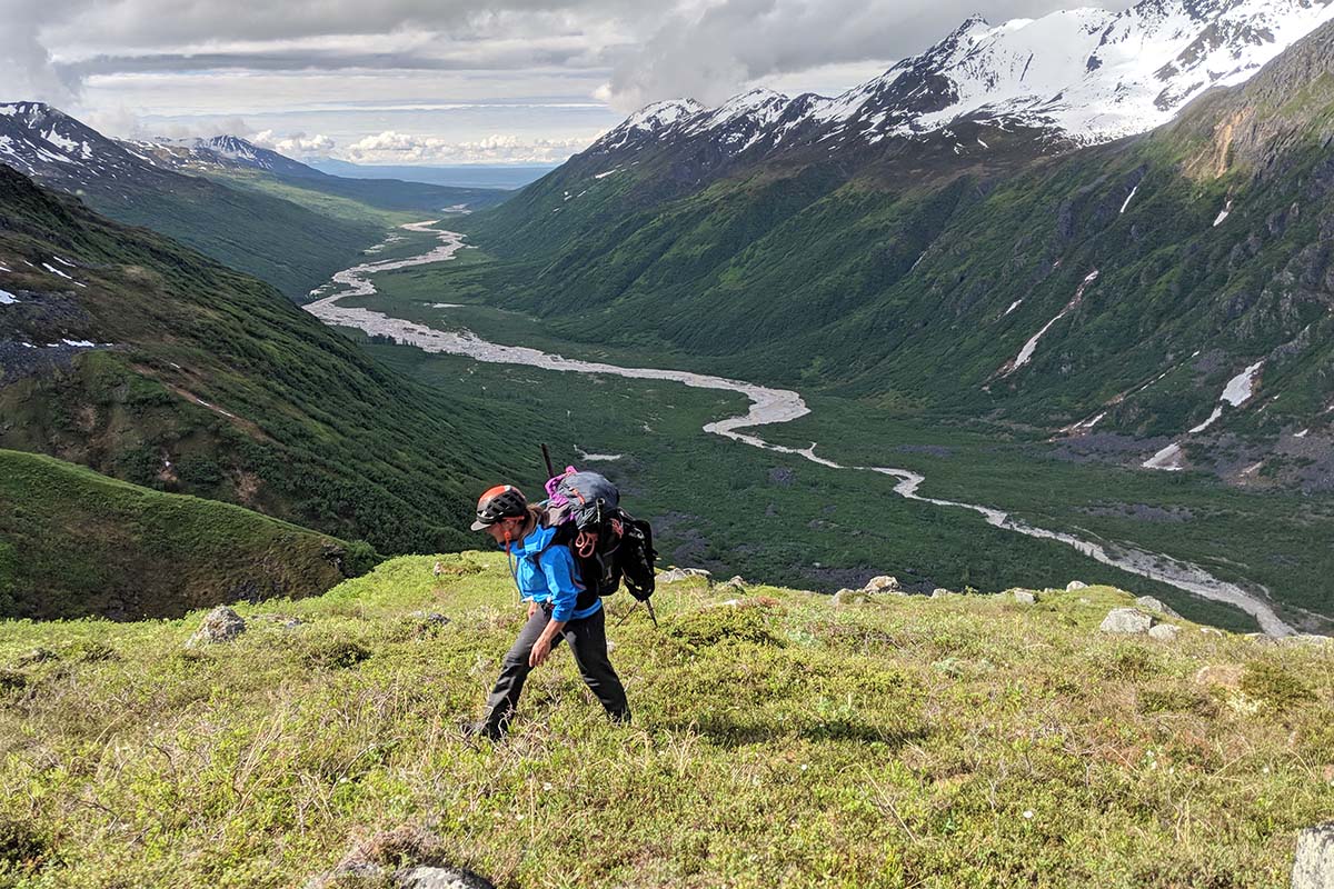 Pack size on packrafting expedition (river in background)