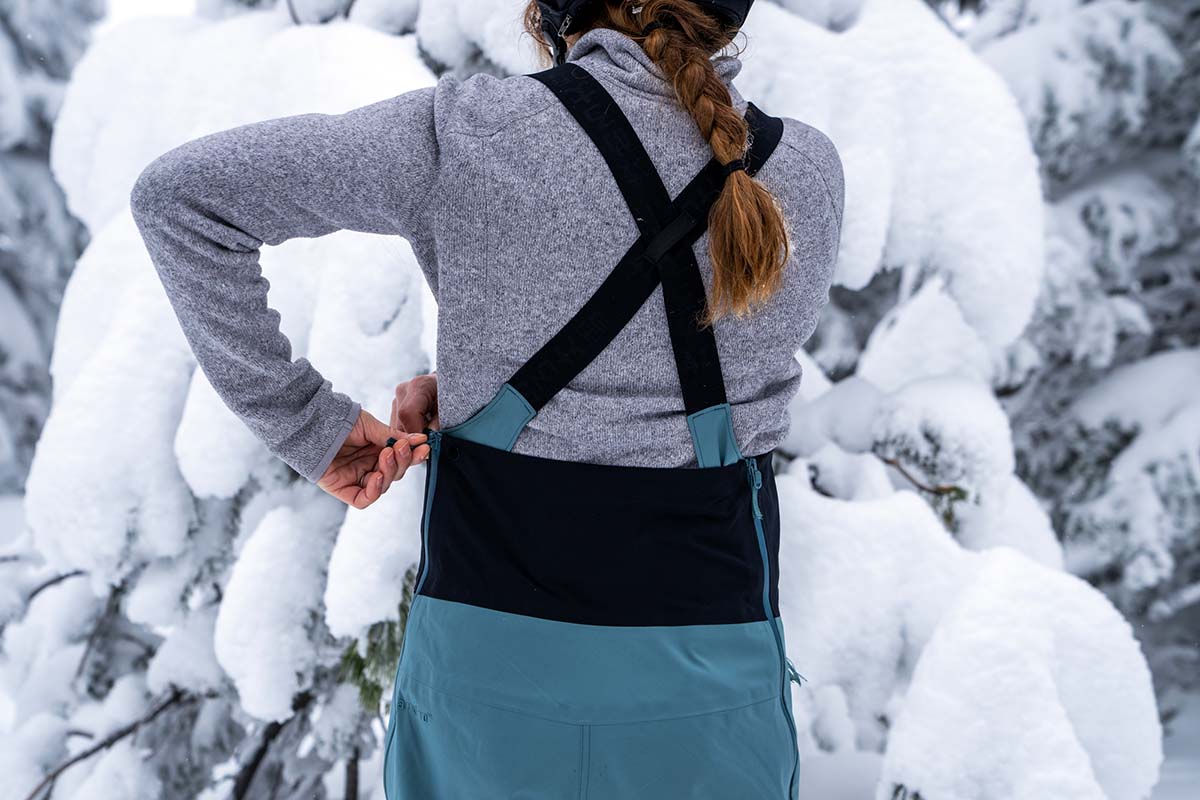 Snowboard bibs with fleece midlayer underneath