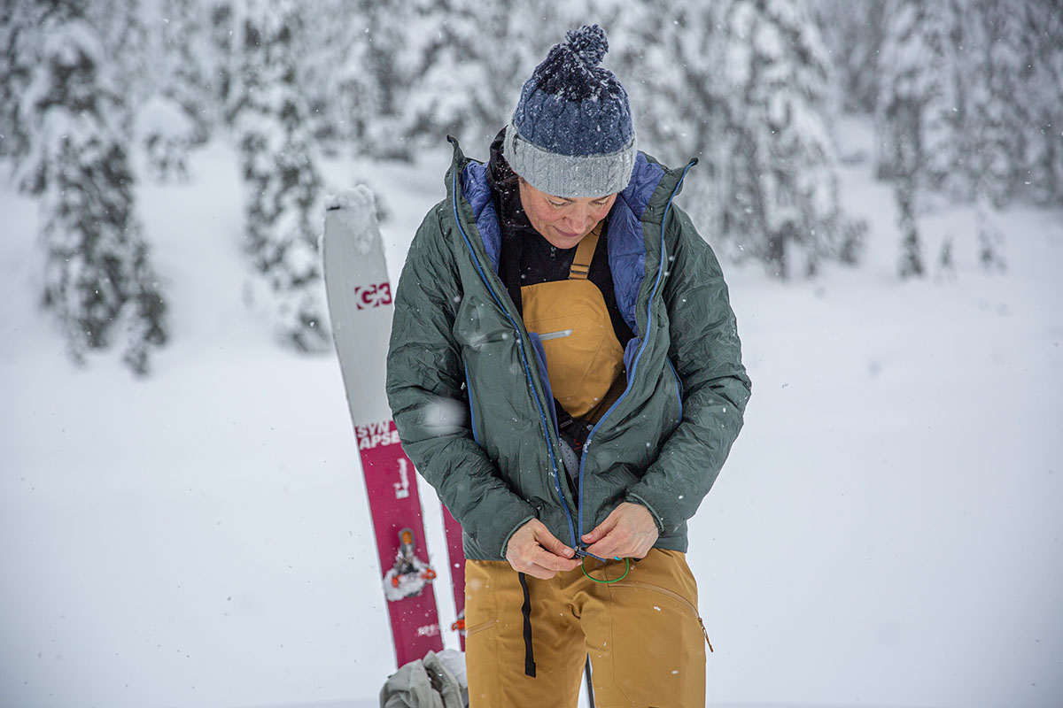 Patagonia ski jacket (zipping up Micro Puff Storm)