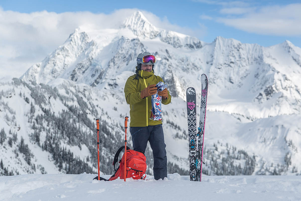 Powder skis (standing next to skis)