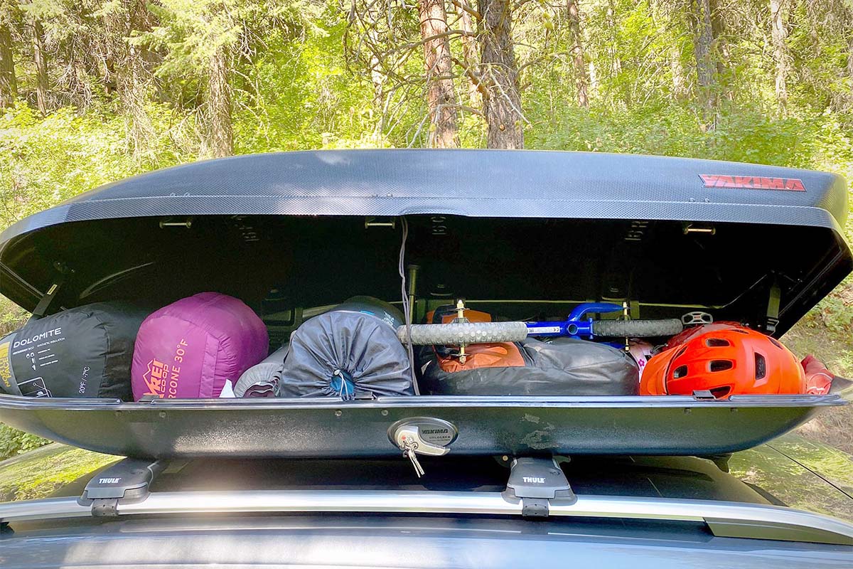 Rooftop cargo box loaded with gear (Yakima SkyBox 16 Carbonite)