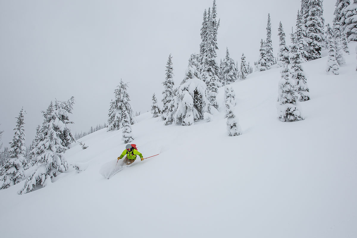 Skiing powder with ski backpack