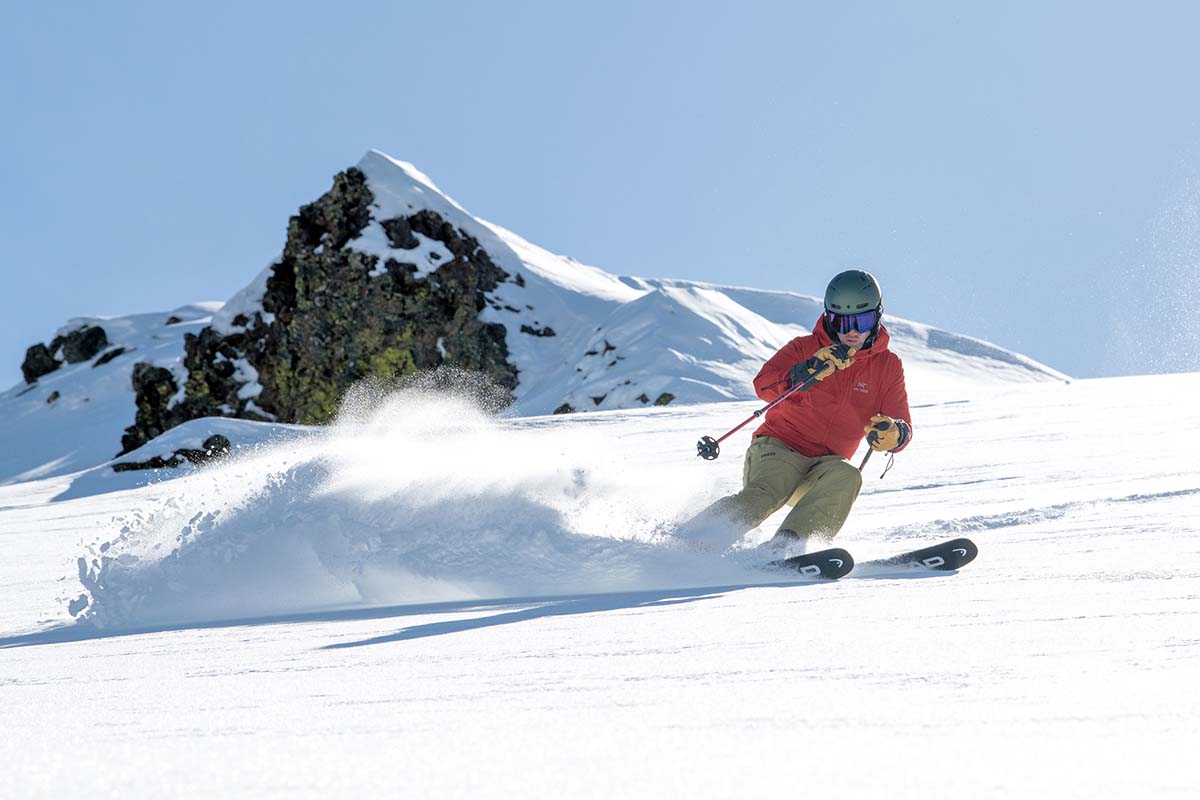 Downhill skiing in the Arc'teryx Gamma LT softshell jacket