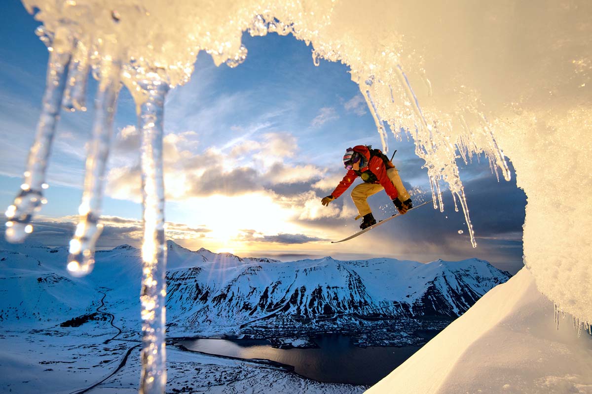 Splitboarding jump in mountains (icicles)