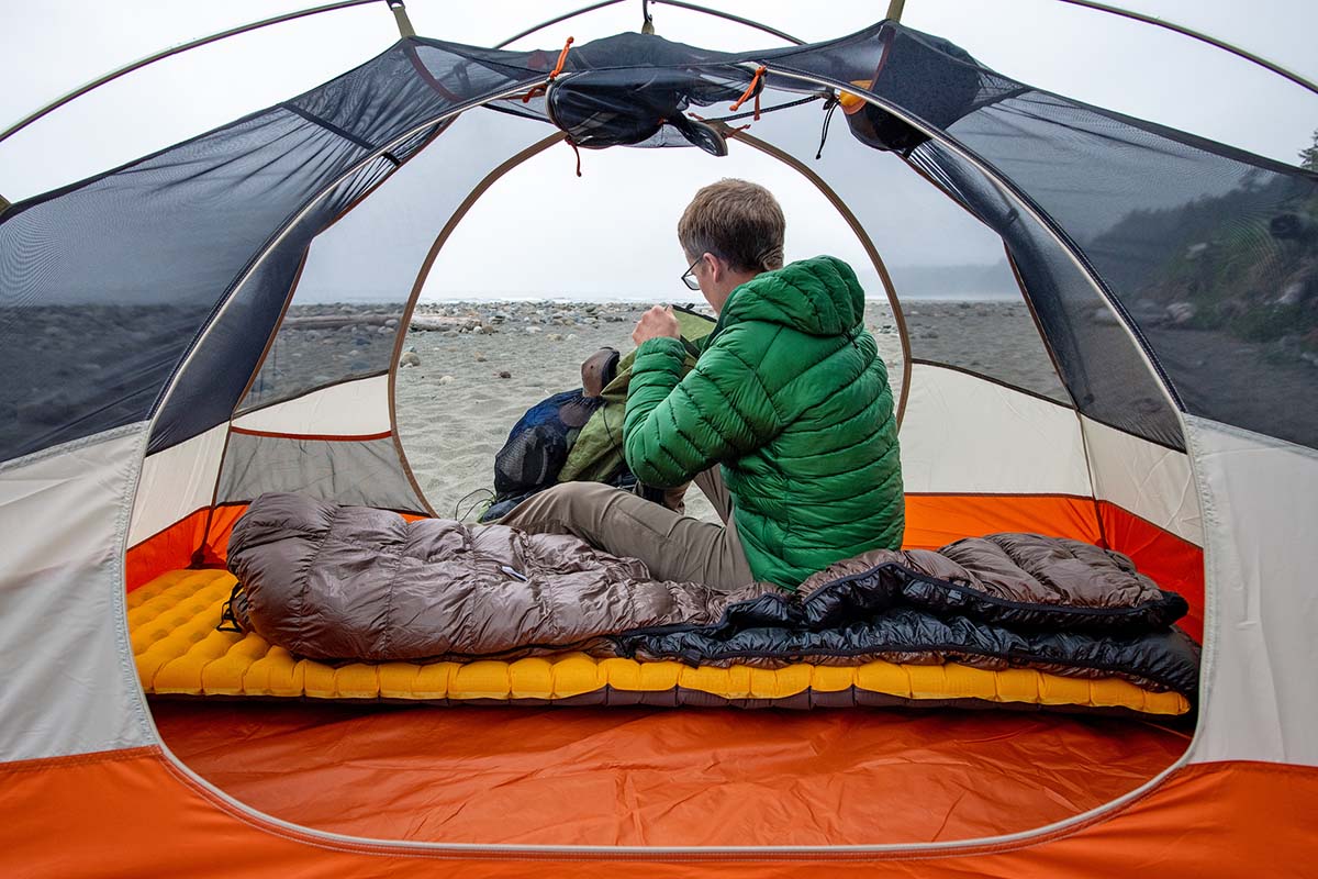 Ultralight sleeping quilt (sitting on quilt and sleeping pad in tent)