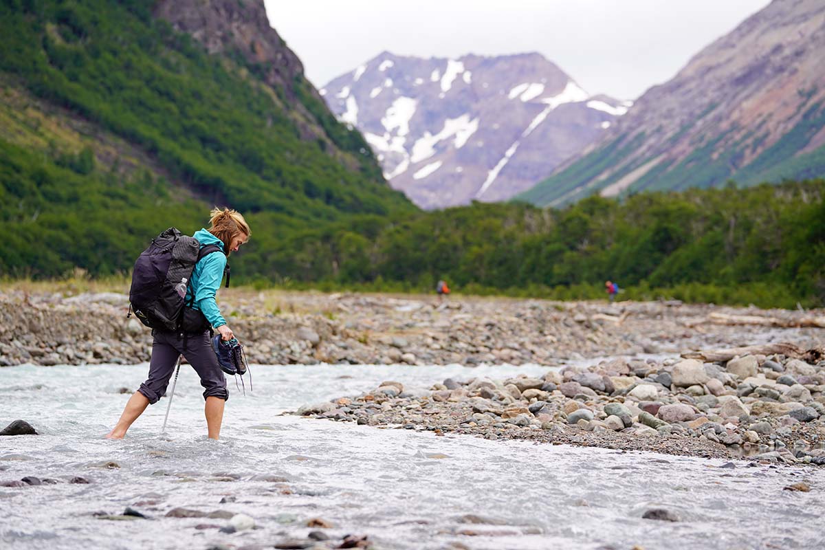 Crossing river in Patagonia (ULA Equipment Circuit ultralight backpack)