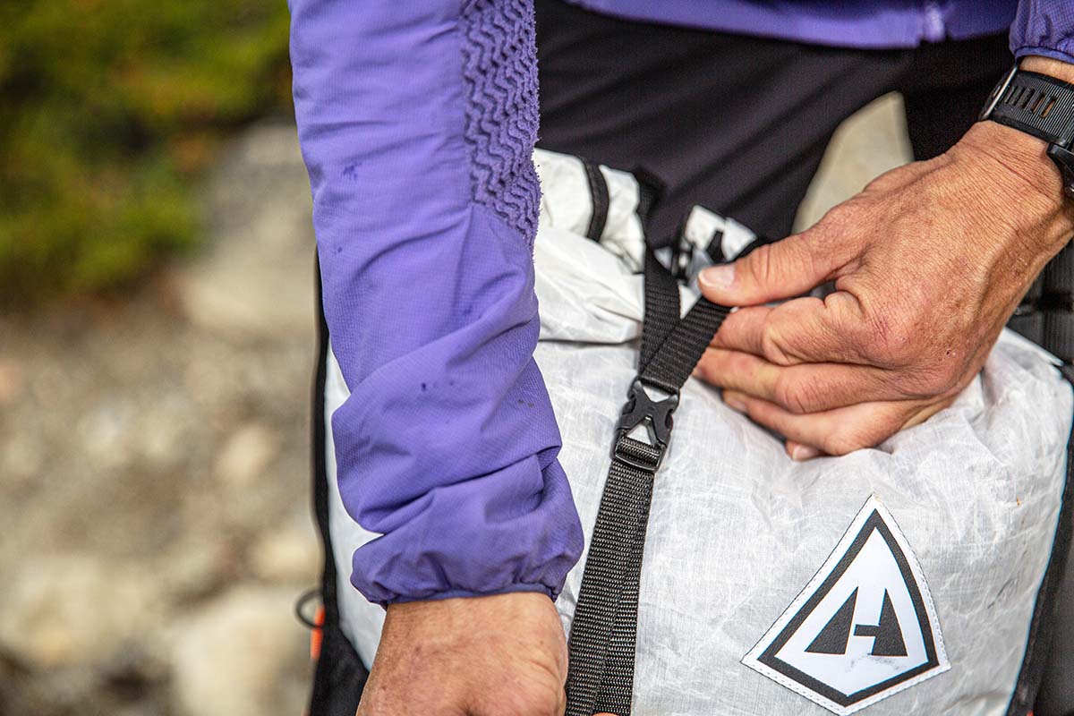 Tightening top strap on Hyperlite Mountain Gear Unbound 40 ultralight backpack