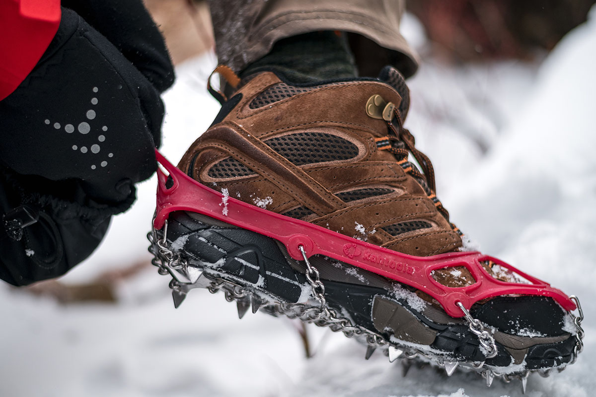 Snowshoes (putting on Kahtoola Microspike)