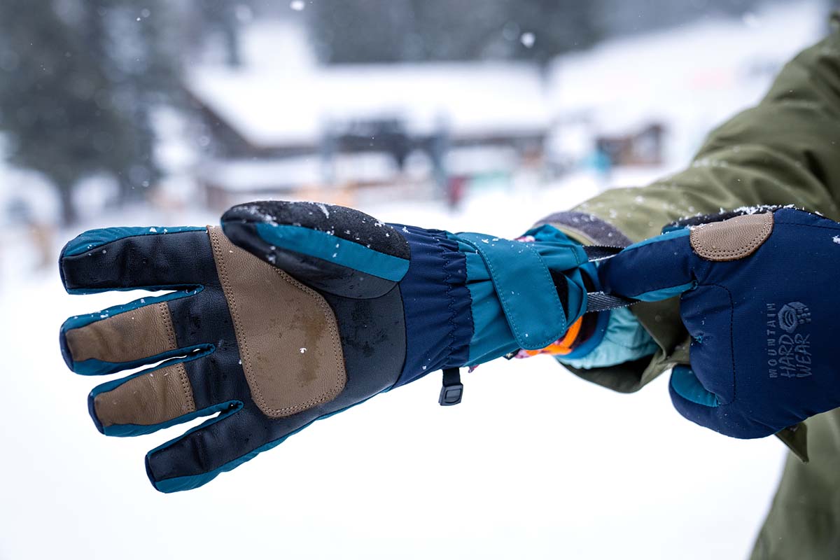 https://www.switchbacktravel.com/sites/default/files/image_fields/Best%20Of%20Gear%20Articles/Winter/Winter%20Gloves/Pulling%20on%20glove%20with%20leather%20palm.jpg