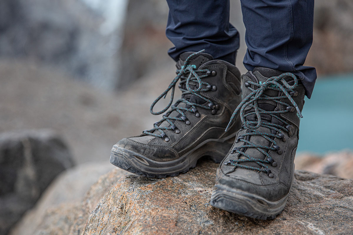Lowa Renegade GTX Mid hiking boot (standing on rock above lake)
