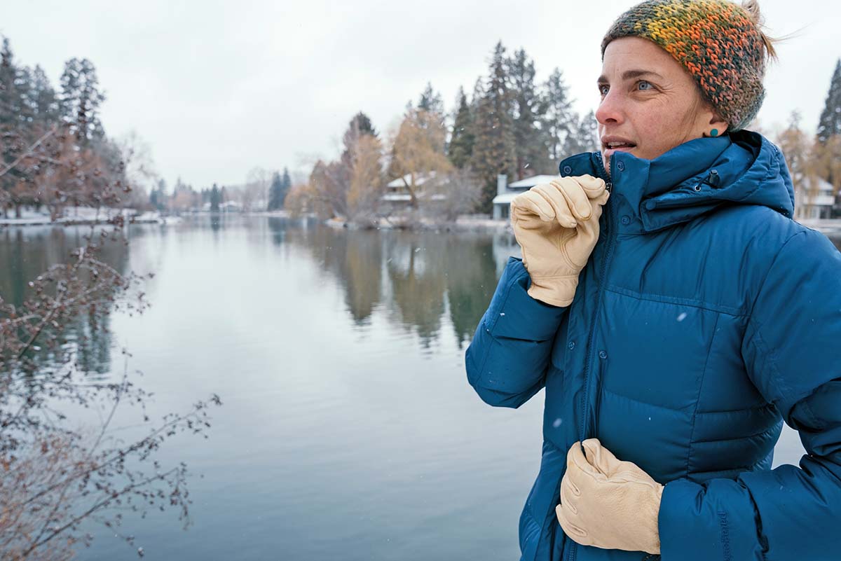 Women's winter jacket (zipping up Patagonia Down With It Parka)