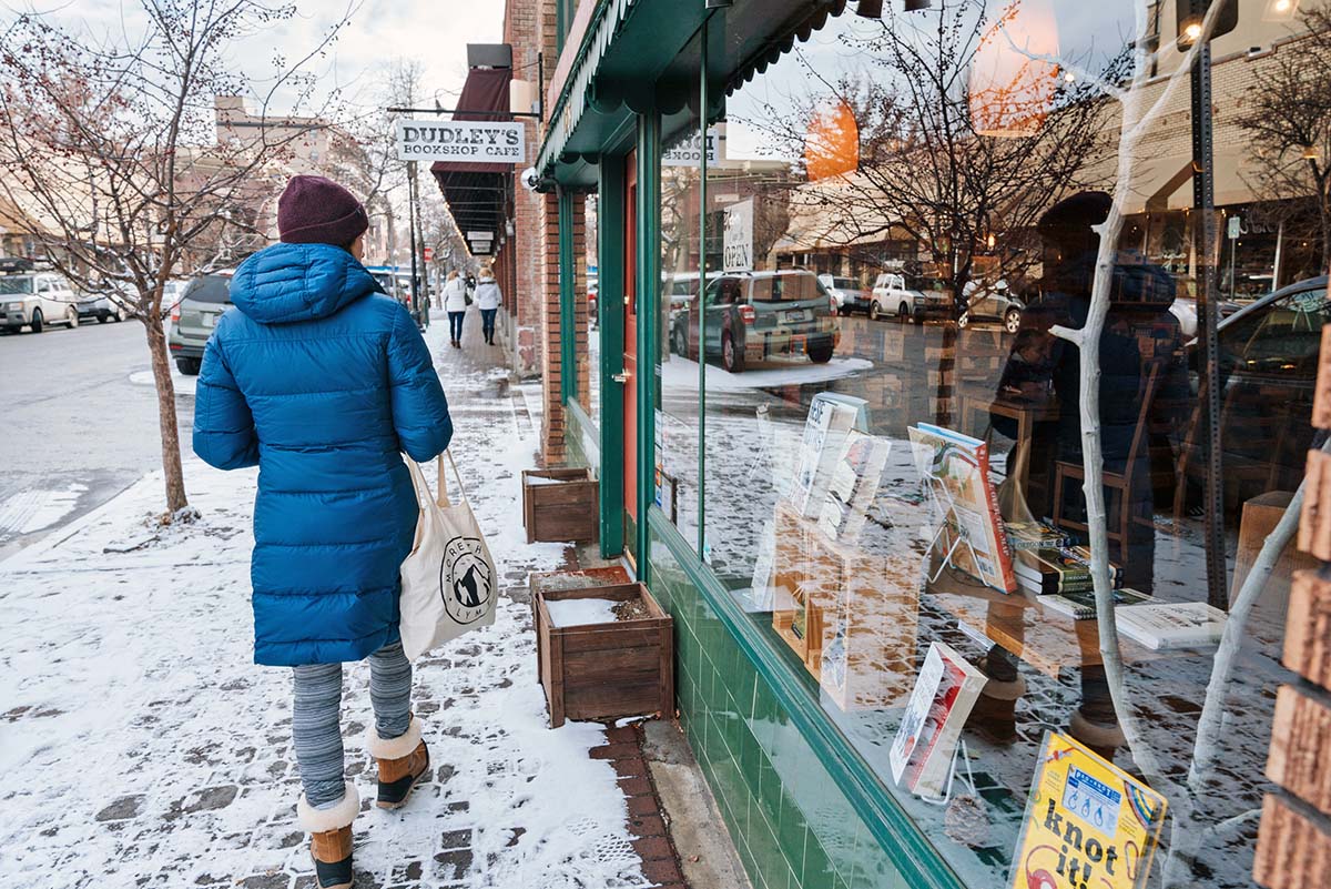 Shopping in the knee-length Patagonia Down With it Parka