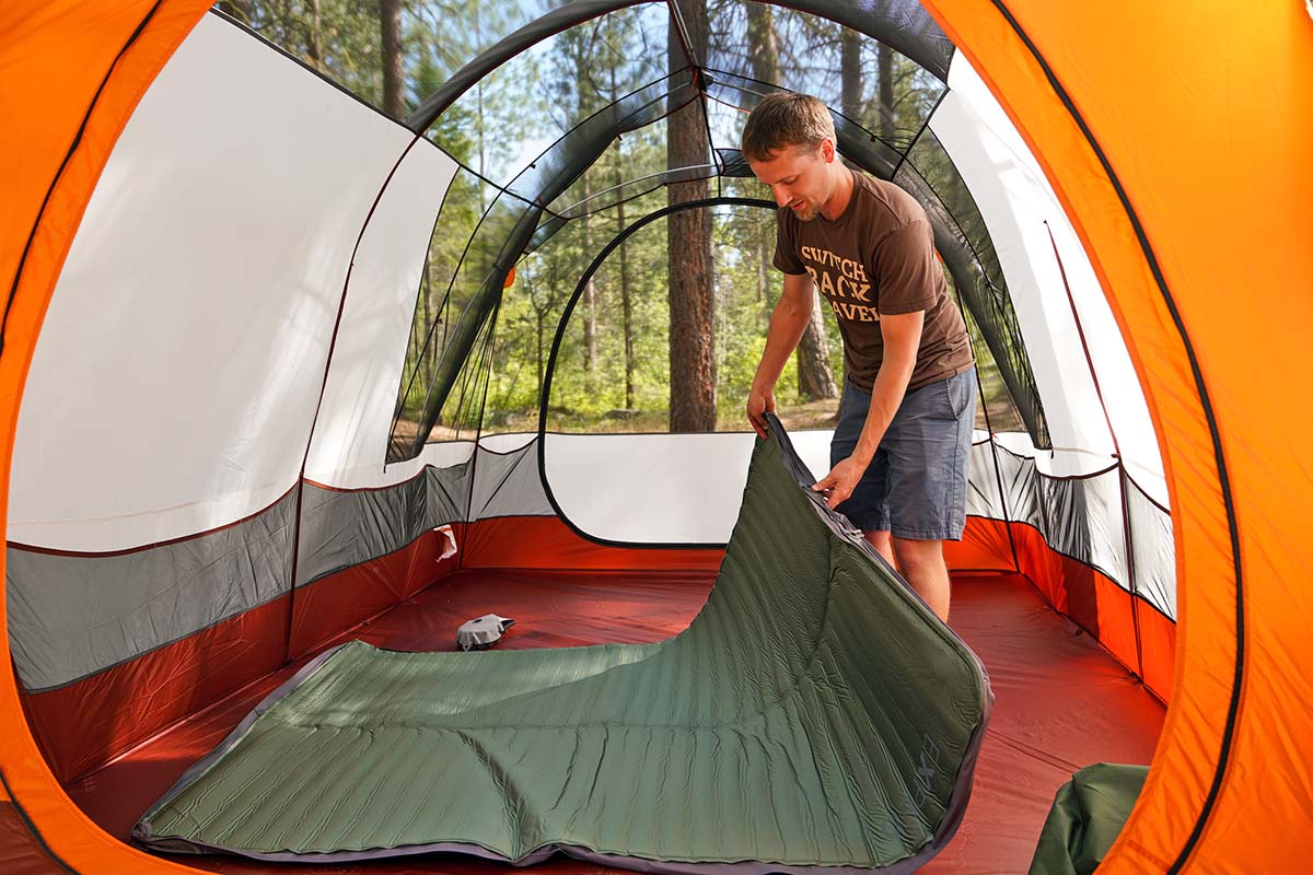 Camping checklist (Exped MegaMat Duo camping mat inside REI tent)