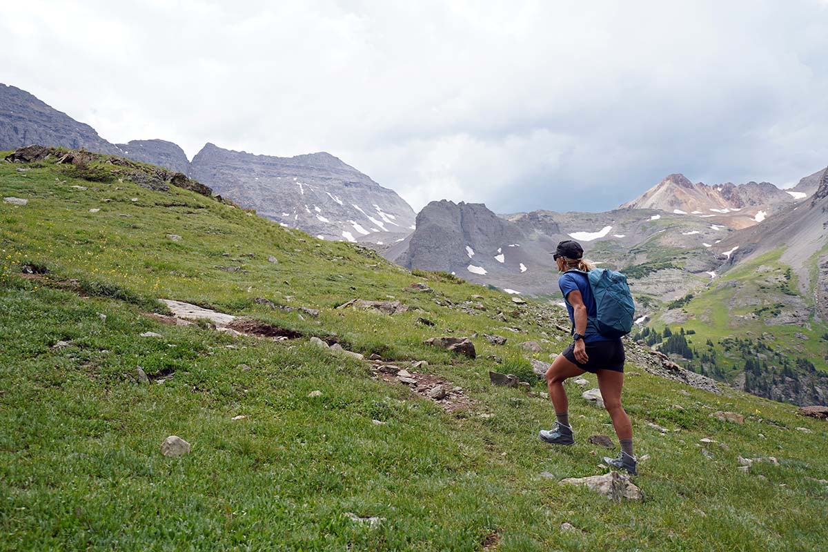 Hiking uphill in mountains (Altra Lone Peak ALL WTHR Mid hiking boot)