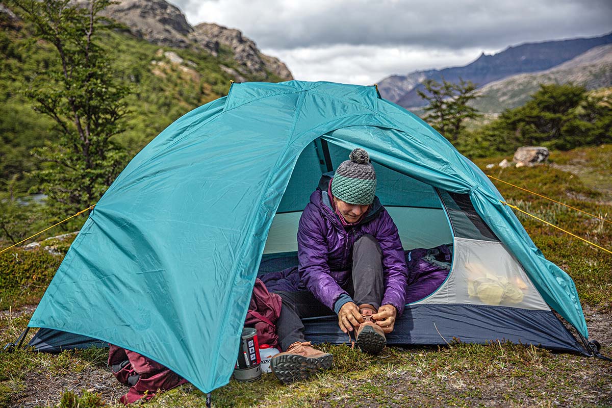 Taking off boots at tent 2 (Altra Lone Peak Hiker 2 hiking boots)