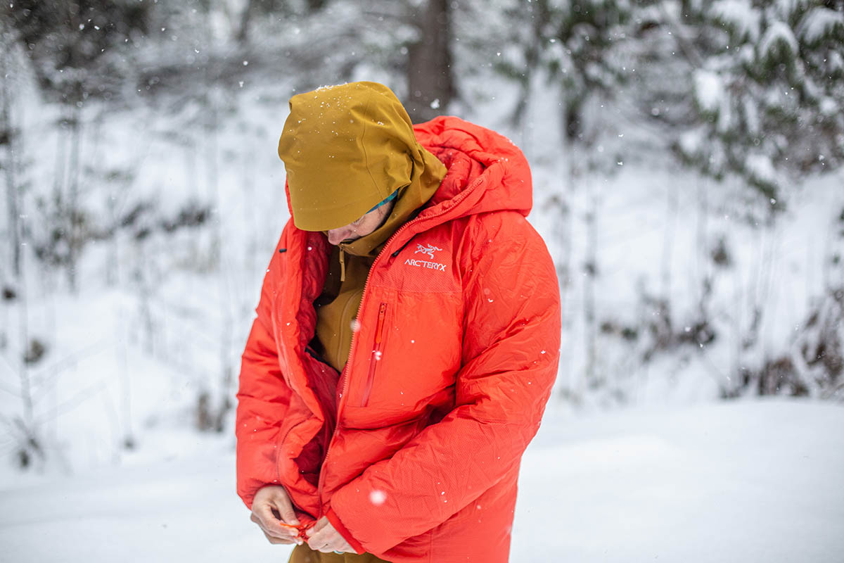 Arc'terx Alpha Parka (zipping up jacket in snow)