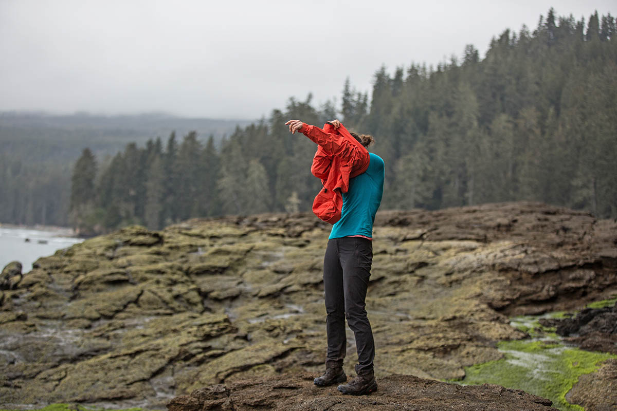 Arc'teryx Alpha SL Anorak (pulling jacket over head)