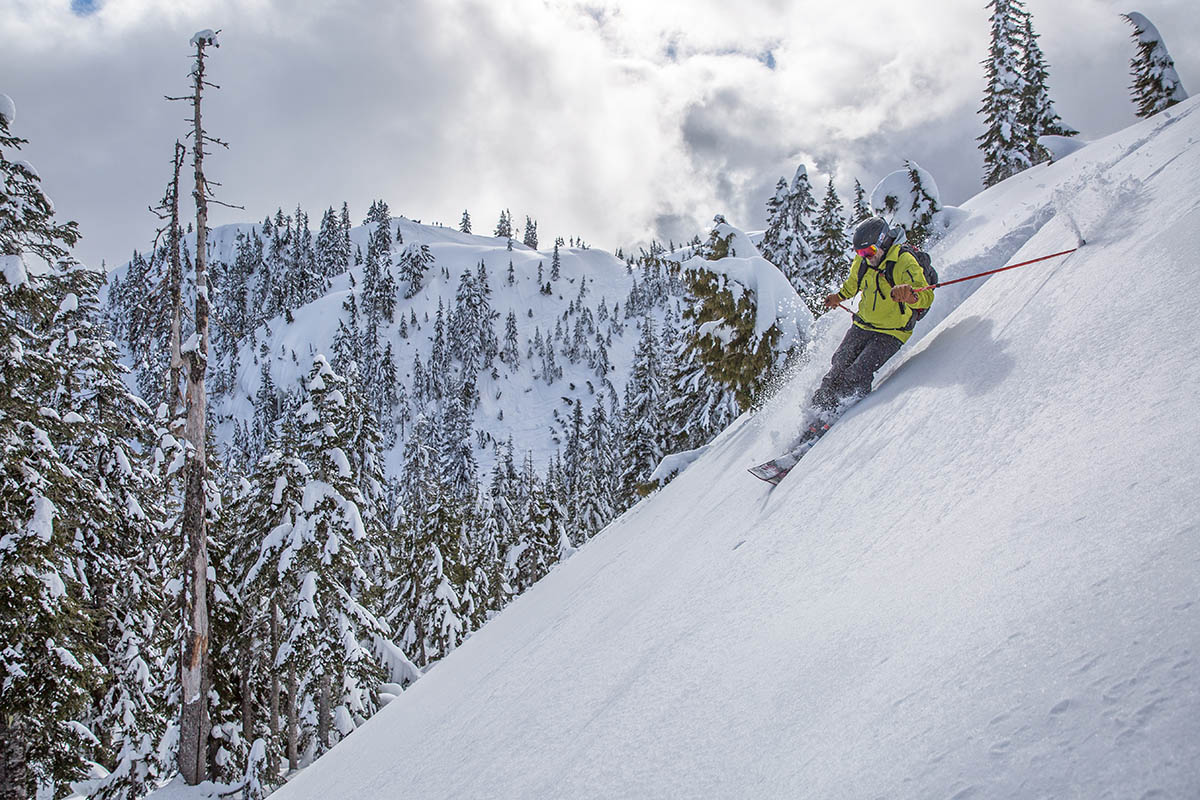 Arc'teryx Alpha SV hardshell jacket (skiing down steep slope)