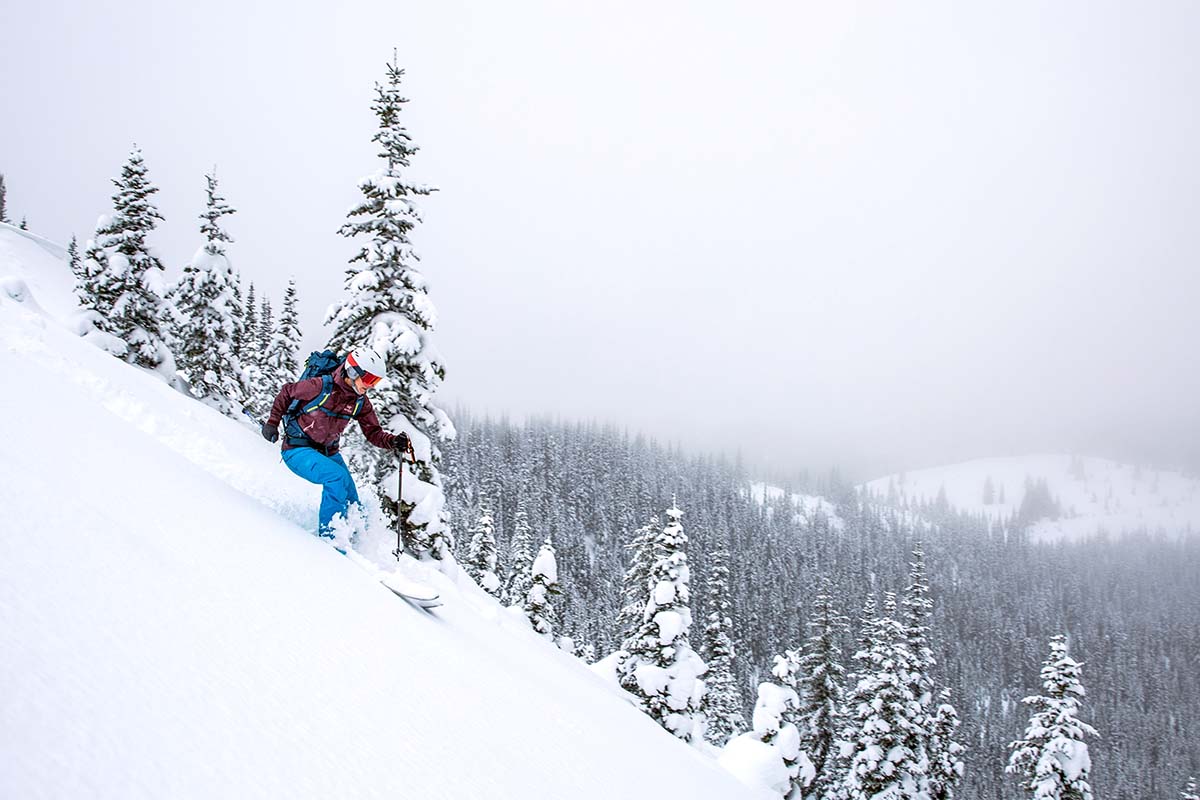Skiing down slope in backcountry (Arc'teryx Beta FL hardshell jacket)