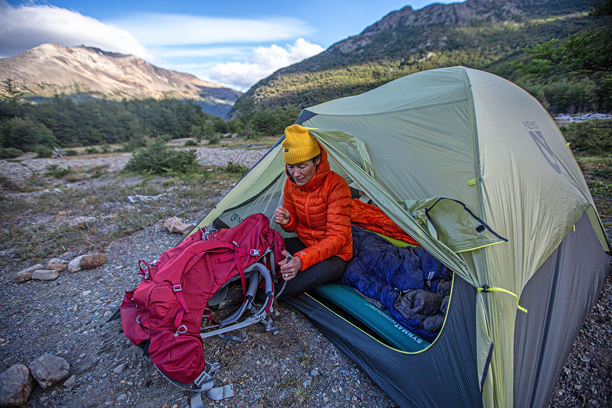 Arc'teryx Cerium SV Hoody (reaching into backpack)