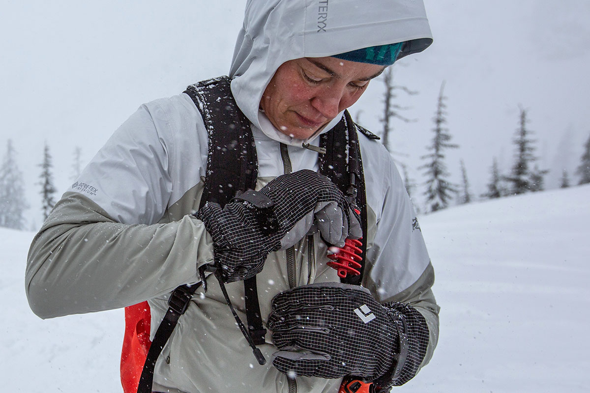 Arc'teryx Proton Hybrid Hoody (zipping up in snow)