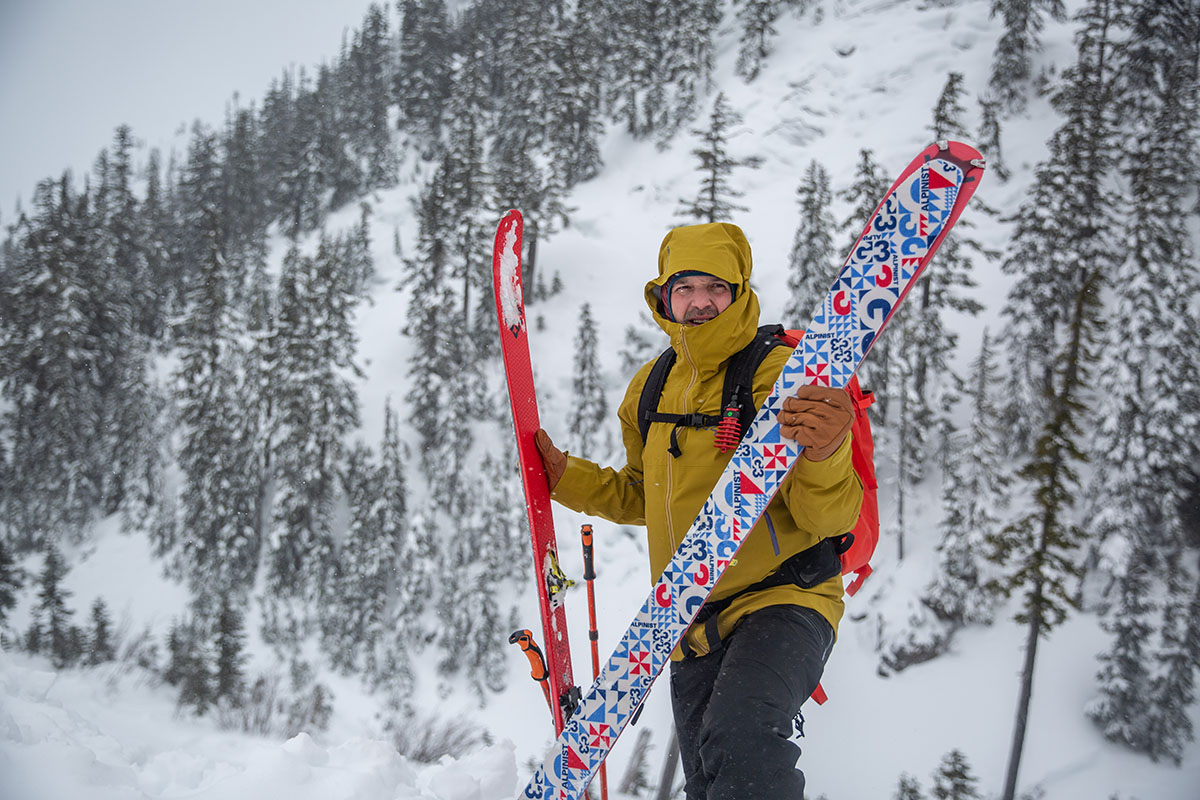 ​​Arc'teryx Sabre Jacket (standing with skis in snow)