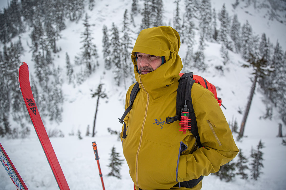 Arc'teryx Sabre Jacket (standing next to skis in backcountry)