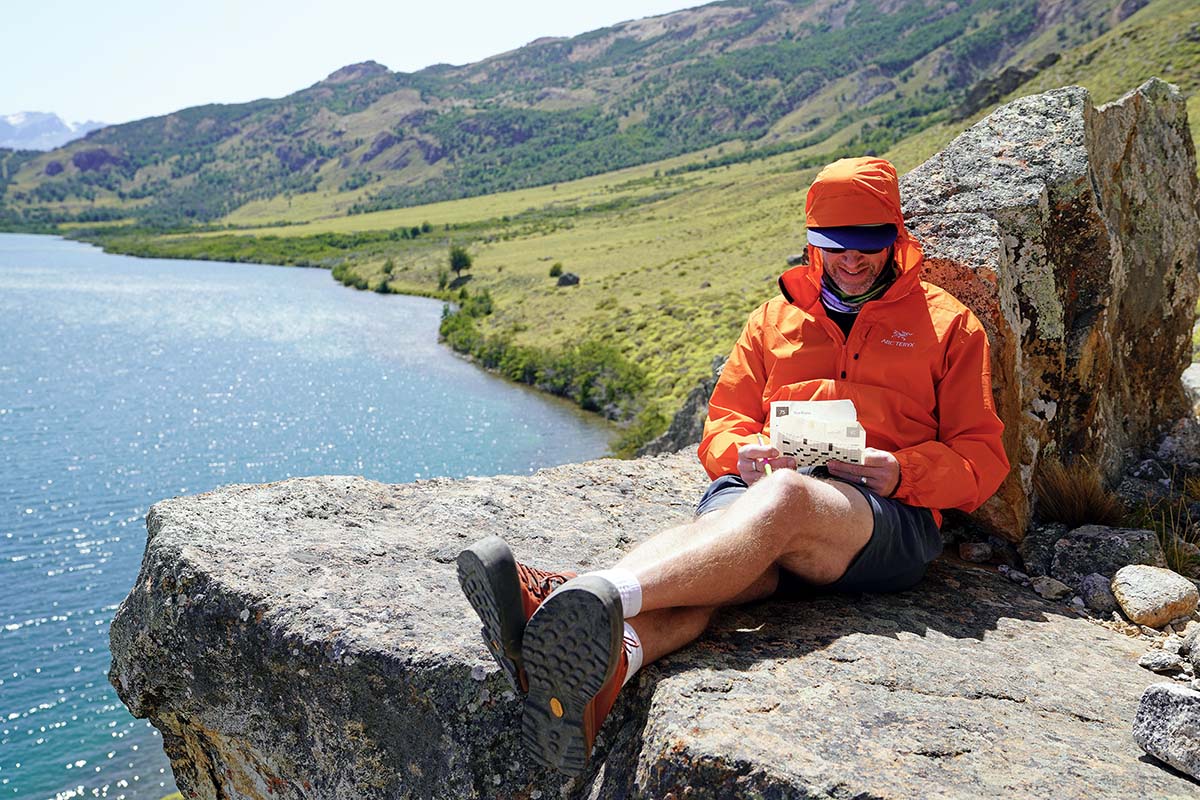 Arc'teryx Squamish Hoody windbreaker jacket (lounging on rock)