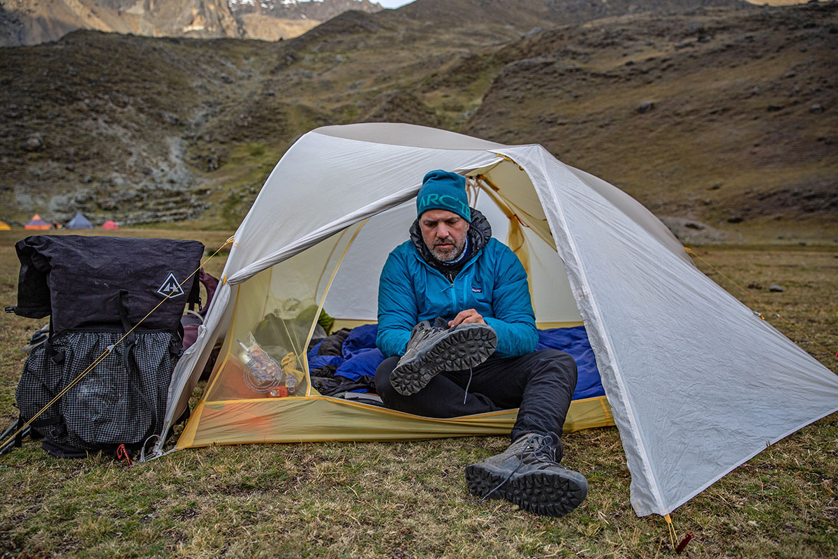 Big Agnes Tiger Wall UL3 mtnGLO Solution Dye tent (putting boots on)