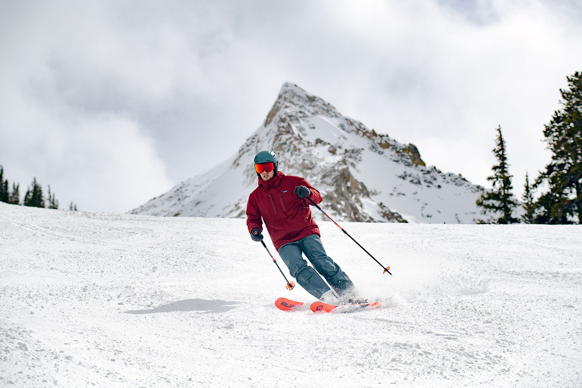 Blizzard Bonafire 97 all-mountain skis (skiing in front of mountain)