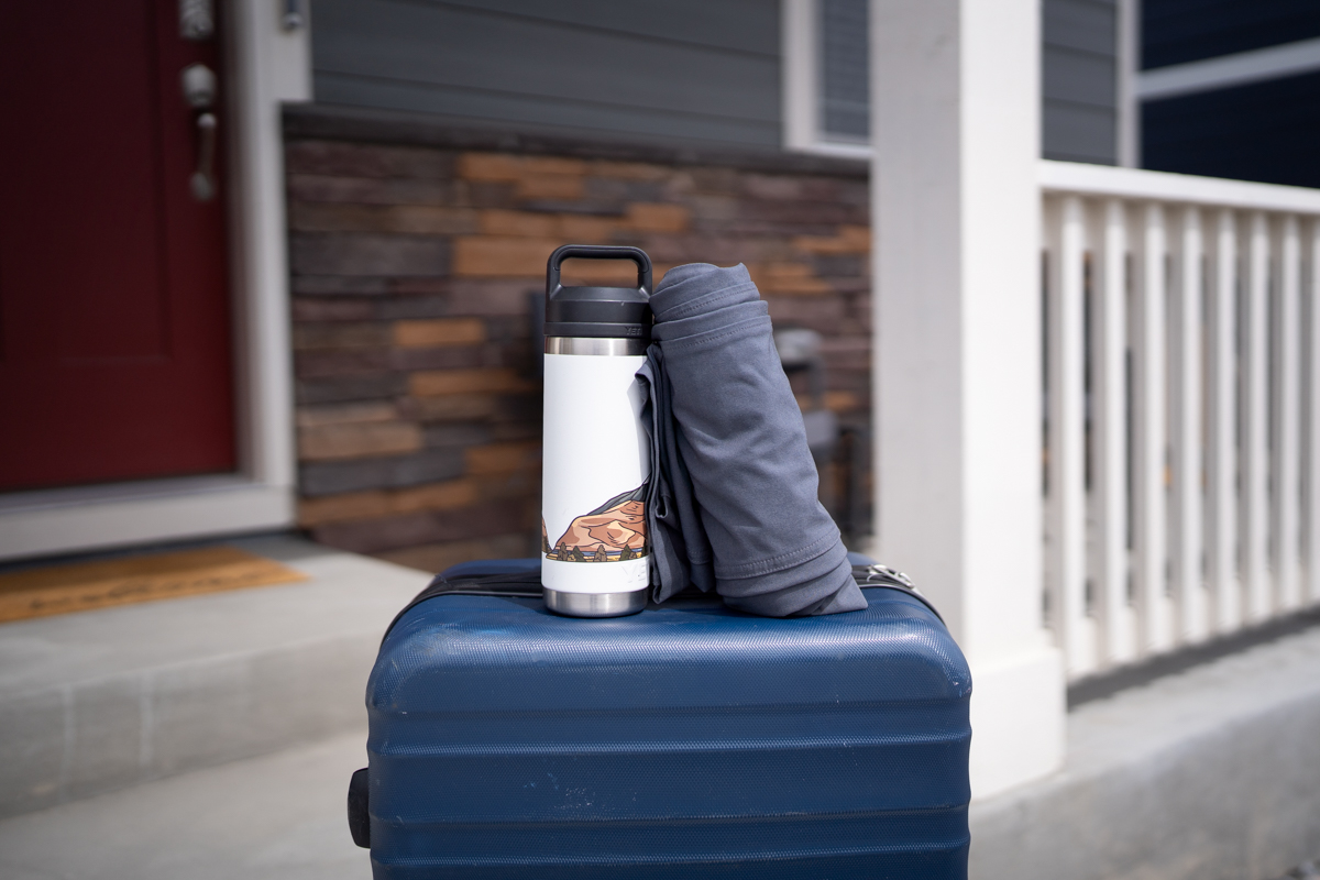 Bluffworks Envoy Lightweight Travel Pants Review (packed size next to a Yeti water bottle)